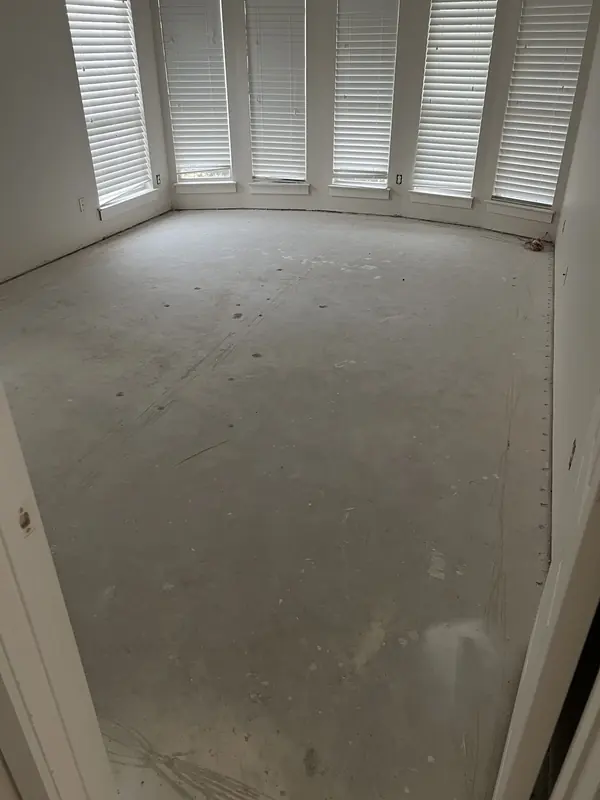 Room prepared with bare subfloor ready for new flooring